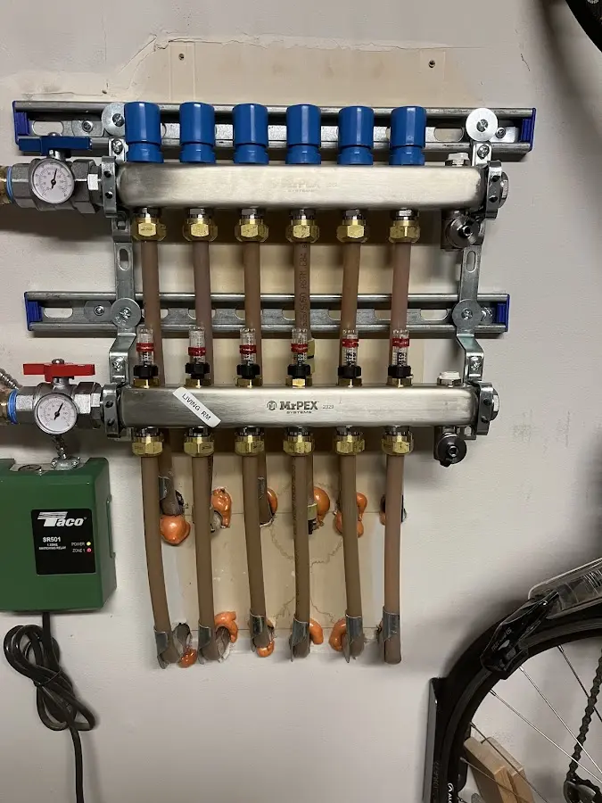 Plumber performing Sink Repair at a residential property in Forsyth